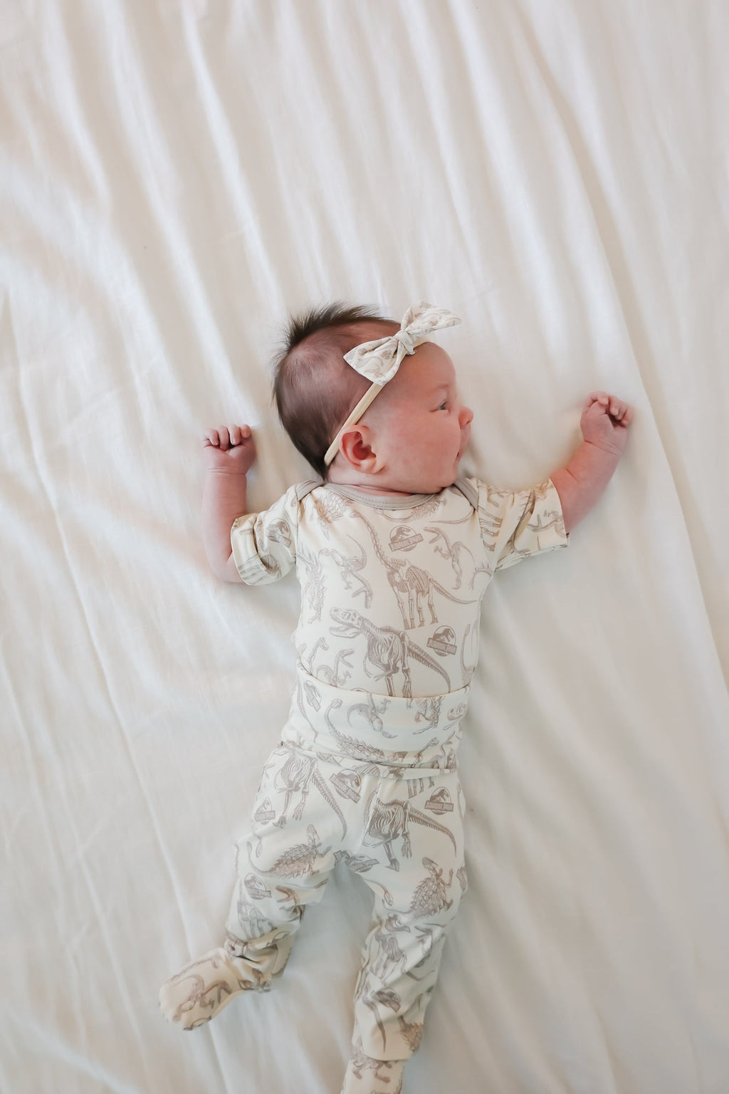 Footed Baby Pants - Jurassic Park Fossils